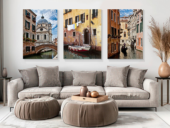 empty poster frames on a white wall in a modern interior apartme