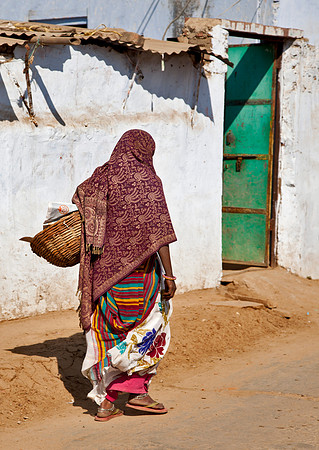 Village Woman with Basket