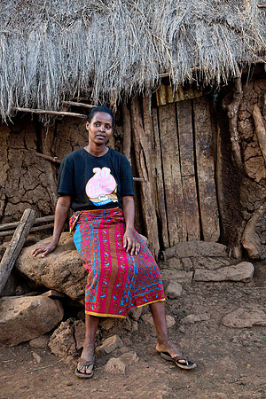Farm Woman & Outbuilding - Serengeti