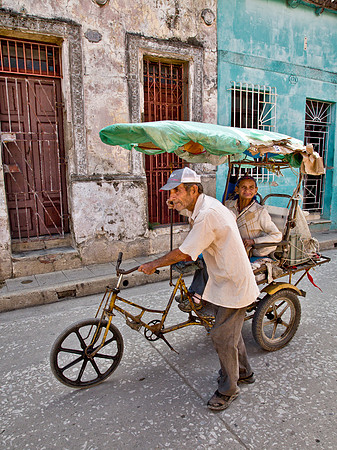 Bicy-taxi Driver Walks His Fare - Camaguey